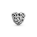 Regal pattern heart silver charm