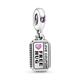 Love coupon sterling silver dangle with pink synthetic sapphire and pink, black and red enamel