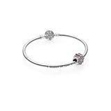 Poinsettia silver charm with red cubic zirconia and clear cubic zirconia