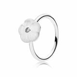 Floral silver ring with mother of pearl and clear cubic zirconia